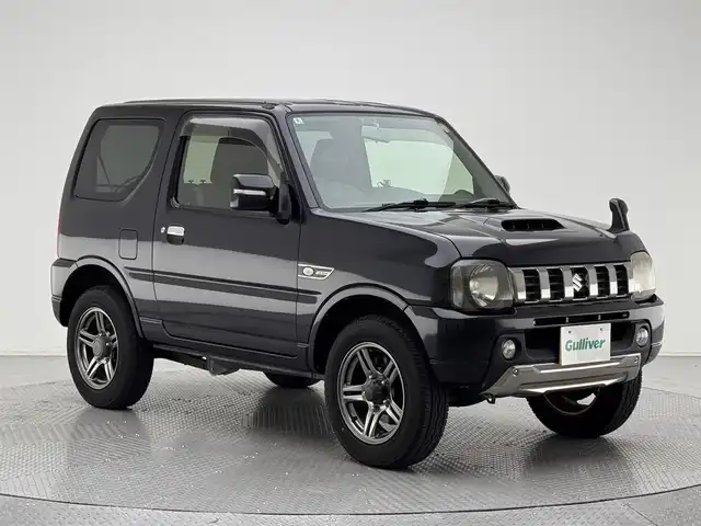 スズキ ジムニー ランドベンチャー 兵庫県 2016(平28)年 5.7万km ブルーイッシュブラックパール3 社外ナビ（ＤＶＤ／ＳＤ／ＢＴ／ワンセグ）/純正ＡＷ16インチ/純正フロアマット/シートヒーター（Ｄ席）/合皮シート/背面タイヤ/４ＷＤ/フォグランプ/電動格納ミラー/ウインカーミラー