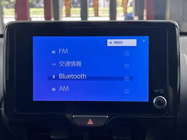 トヨタ ヤリス ハイブリッド Z 愛知県 2024(令6)年 2.7万km プラチナホワイトパールマイカ 禁煙車/純正8インチナビ/（Bluetooth/USB/AM/FM/Miracast)/バックカメラ/AC100V電源/トヨタセーフティセンス/・プリクラッシュセーフティ/・レーントレーシングアシスト/・レーダークルーズコントロール(全車速追従機能)/・オートマチックハイビーム/・ロードサインアシスト/・先行車発進告知機能/・ブラインドスポットモニター/ETC/シートヒーター/ステアリングヒーター/スマートキー/スペアキー1本/プッシュスタート/横滑り防止装置