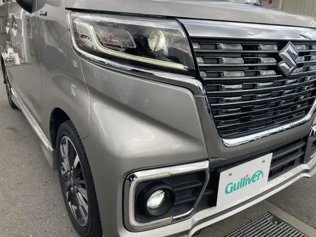 スズキ スペーシア カスタム HYBRID XS ターボ 静岡県 2018(平30)年 5.1万km スチールシルバーM スズキセーフティサポート/純正8インチナビ(CN-RZ843)/　AM FM CD DVD Bluetooth USB SD/ETC/LEDオートヘッドランプ/レーダークルーズコントロール/ハーフレザーシート/シートヒーター(運転席)/両側パワースライドドア/リアクリアランスソナー/純正15インチアルミホイール/スマートキー＆プッシュスタート/パドルシフト/リアサンシェード/フルセグTV/バックモニター