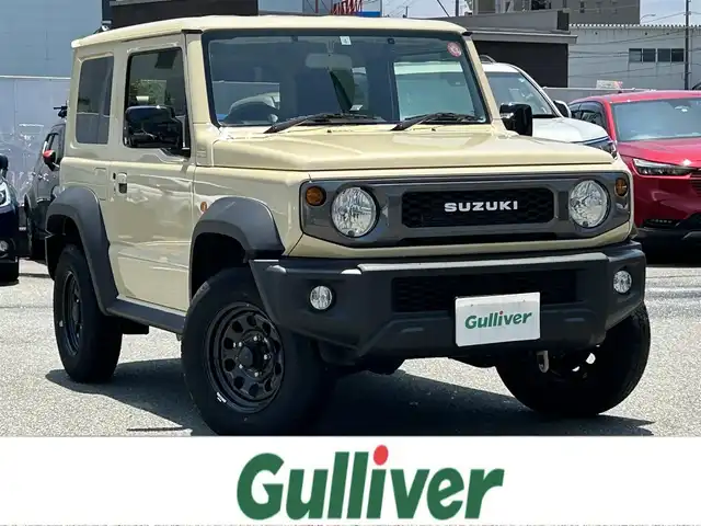 スズキ ジムニー シエラ JL 福岡県 2023(令5)年 1.8万km シフォンアイボリーM ワンオーナー/パイオニア製純正ナビ（PVH-9300DVSZ）/（AM/FM/BT/CD/DVD）/ビルトインETC/ドライブレコーダー/背面タイヤ/バックカメラ/クルーズコントロール/４WD/ダウンヒルアシストコントロール/プッシュスタート/スペアキー×１/フォグライト/純正フロアマット/純正15インチアルミホイール/衝突被害軽減システム/横滑り防止装置/保証書/取扱説明書