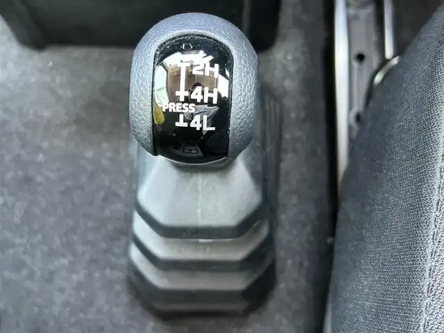 スズキ ジムニー シエラ JL 福岡県 2023(令5)年 1.8万km シフォンアイボリーM ワンオーナー/パイオニア製純正ナビ（PVH-9300DVSZ）/（AM/FM/BT/CD/DVD）/ビルトインETC/ドライブレコーダー/背面タイヤ/バックカメラ/クルーズコントロール/４WD/ダウンヒルアシストコントロール/プッシュスタート/スペアキー×１/フォグライト/純正フロアマット/純正15インチアルミホイール/衝突被害軽減システム/横滑り防止装置/保証書/取扱説明書