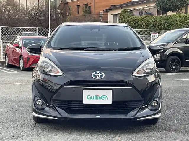 トヨタ アクア S スタイルブラック 熊本県 2018(平30)年 7.6万km ブラックマイカ モデリスタエアロ/衝突軽減ブレーキ/レーンキープアシスト/プッシュスタート/純正ナビ/（CD・DVD・フルセグTV・BTオーディオ・SD）/バックカメラ/ビルトインETC/社外15インチAW/LEDヘッドライト/オートライト/フォグライト/前後コーナーセンサー/横滑り防止装置/ウィンカーミラー/純正フロアマット/ドアバイザー