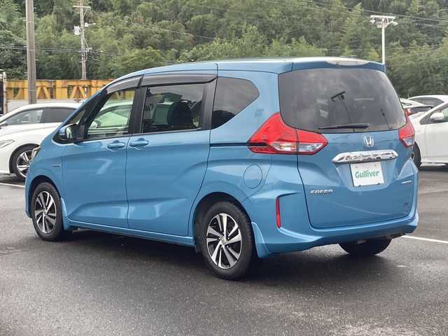 ホンダ フリード ハイブリット EX 佐賀県 2016(平28)年 9.8万km ブルーホライゾンM Gathers9インチナビ/バックカメラ/両側パワースライドドア/衝突被害軽減ブレーキ/路線逸脱警報/アダプティブクルーズコントロール/ビルトインETC/ハーフレザーシート/シートヒーター/ステアリングリモコン/ハーフレザーシート/シートヒーター/プッシュスタート/スマートキー/LEDヘッドライト/純正アルミホイール