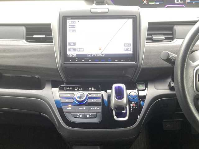 ホンダ フリード ハイブリット EX 佐賀県 2016(平28)年 9.8万km ブルーホライゾンM Gathers9インチナビ/バックカメラ/両側パワースライドドア/衝突被害軽減ブレーキ/路線逸脱警報/アダプティブクルーズコントロール/ビルトインETC/ハーフレザーシート/シートヒーター/ステアリングリモコン/ハーフレザーシート/シートヒーター/プッシュスタート/スマートキー/LEDヘッドライト/純正アルミホイール