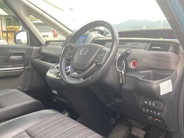 ホンダ フリード ハイブリット EX 佐賀県 2016(平28)年 9.8万km ブルーホライゾンM Gathers9インチナビ/バックカメラ/両側パワースライドドア/衝突被害軽減ブレーキ/路線逸脱警報/アダプティブクルーズコントロール/ビルトインETC/ハーフレザーシート/シートヒーター/ステアリングリモコン/ハーフレザーシート/シートヒーター/プッシュスタート/スマートキー/LEDヘッドライト/純正アルミホイール