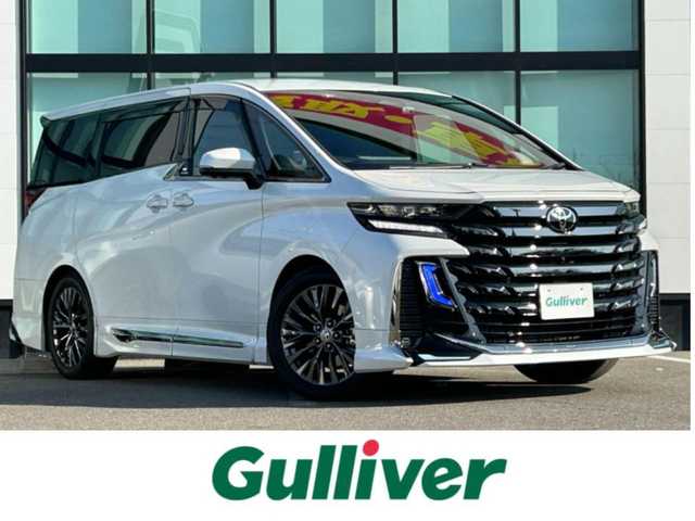 トヨタ ヴェルファイア ハイブリット Z プレミア 和歌山県 2023(令5)年 2.1万km プラチナホワイトパールマイカ モデリスタエアロ/サンルーフ/ユニバーサルステップ/シグネチャーイルミネーション/純正メーカーナビ/純正フリップダウンモニター/TVキャンセラー/デジタルインナーミラー/パノラミックビューモニター/プリクラッシュセーフティー/レーダークルーズコントロール/ブラインドスポットモニター/クリアランスソナー/両側パワースライドドア/パワーバックドア/パワーシート/シートヒーター/シートエアベンチレーション/前後ドライブレコーダー/純正アルミホイール/純正フロアマット/LEDヘッドライト/フォグランプ/オートライト/オートマチックハイビーム