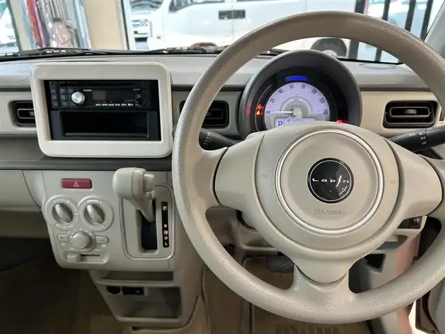 スズキ ラパン L 東京都 2015(平27)年 6.9万km コフレピンクパールメタリック 純正オーディオ/D席シートヒーター/衝突軽減ブレーキ/ISOFIX/アイドリングストップ/電動格納ミラー/純正14インチスチールホイール/WSRS＆ABS/横滑り防止装置/取扱説明書/保証書