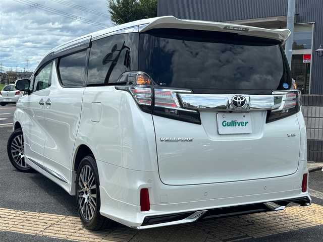 トヨタ ヴェルファイア ZA Gエディション 京都府 2017(平29)年 11.2万km ホワイトパールクリスタルシャイン  4WD ワンオーナー/ モデリスタスポイラー/ クロフルレザーシート/ シートヒーター/ アクセサリーコンセント　4ケ/ 両側パワースライドドア/ パワーリアゲート/ 純正9インチSDナビ　フルセグ/ フリップダウンモニター/ HDMIポート/ 純正18インチアルミ/ 保証書　取説あり