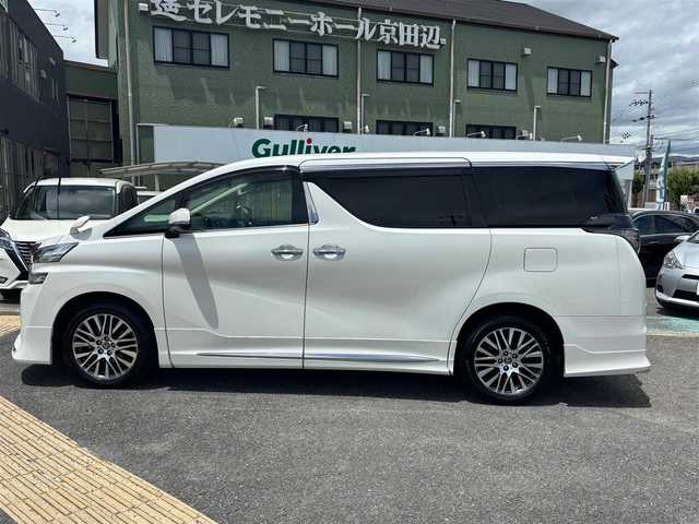 トヨタ ヴェルファイア ZA Gエディション 京都府 2017(平29)年 11.2万km ホワイトパールクリスタルシャイン  4WD ワンオーナー/ モデリスタスポイラー/ クロフルレザーシート/ シートヒーター/ アクセサリーコンセント　4ケ/ 両側パワースライドドア/ パワーリアゲート/ 純正9インチSDナビ　フルセグ/ フリップダウンモニター/ HDMIポート/ 純正18インチアルミ/ 保証書　取説あり
