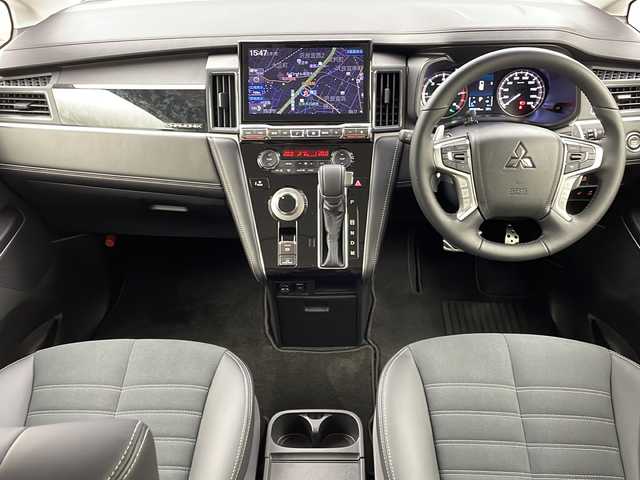 三菱 デリカＤ：５ シャモニー 大阪府 2025(令7)年 0.4万km ブラックダイヤモンド ALIPINE11型専用ナビ/【フルセグTV/Bluetooth/CD/DVD/HDMI/USB】/8人乗り/オートステップ/アラウンドビューモニター/パワーバックドア/両側パワースライドドア/ブラインドスポットモニター(BSM)/e-Assist/衝突被害軽減ブレーキ/レーダークルーズコントロール/車線逸脱警報システム/オートマチックハイビーム/後側方車両検知警報システム/前後コーナーセンサー/オートホールド/ハーフレザーシート/シートヒーター/ステアリングヒーター/パドルシフト/LEDヘッドライト/純正18インチアルミホイール/スマートキー/スペアキー1本