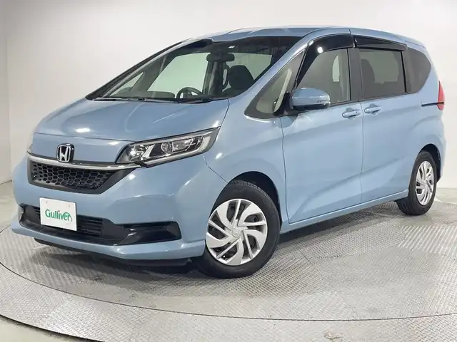 ホンダ フリード G ホンダセンシング 広島県 2020(令2)年 5万km シーグラスブルーパール 禁煙車/純正ナビ/バックカメラ/レーダークルーズコントロール/シートヒーター/両側パワースライドドア/ＥＴＣ/フルセグ/コーナーセンサー/衝突軽減/オートライト/レーンキープ/踏み間違い防止/ＬＥＤヘッドライト/純正15インチホイールキャップ(185/65/R15)/エアバッグ(運転席/助手席)