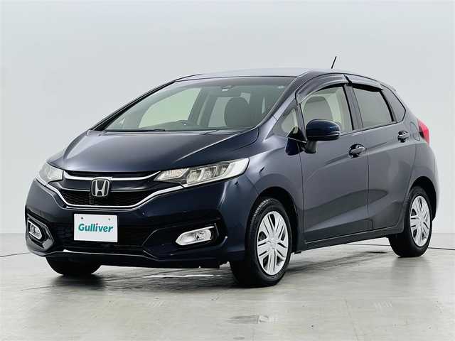 ホンダ フィット 13G L ホンダセンシング 福井県 2017(平29)年 4.5万km ミッドナイトブルービームM ホンダセンシング　/・レーダークルーズコントロール/・先行車発進告知/・車線逸脱警報/・レーンキープアシスト/・標識認識機能/バックカメラ　/ビルトインＥＴＣ　/ディスプレイオーディオ　/プッシュスタート　/・スマートキー　/・スペアキー　/ステアリングスイッチ　/オートライト　/・ＬＥＤライト　/・ＬＥＤフォグ　/・電動格納ミラー/電動格納ウィンカーミラー/純正フロアマット/ドアバイザー　