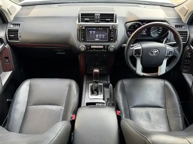 トヨタ ランドクルーザー プラド TX Lパッケージ 滋賀県 2016(平28)年 8.7万km ホワイトパールクリスタルシャイン 禁煙車/モデリスタエアロ/黒レザーシート/純正SDナビ/・CD/DVD/Bluetooth//バックカメラ/LEDヘッドライト/ビルトインETC/パワーシート/シートヒーター/ウッドコンビステアリング/ステアリングスイッチ/クリアランスソナー/オートライト