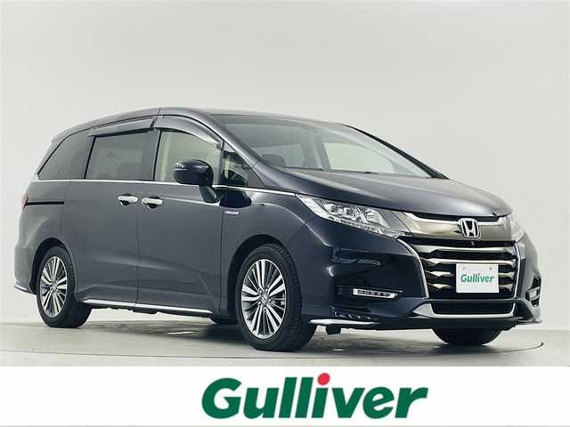 ホンダ オデッセイ ハイブリッド アブソルート・EXホンダセンジング 埼玉県 2018(平30)年 2.6万km プレミアムヴィーナスブラックP ＭＣ後期　両側電動ドア　純正MOPギャザーズ９型ナビ　純正フリップダウンモニター　全周囲モニター　ハーフレザーシート　シートヒーター　パワーシート　後席オットマン　ビルトインＥＴＣ　２．０　前後ドラレコ　Ｂluetooth　フルセグＴＶ HDMI Fフォグ