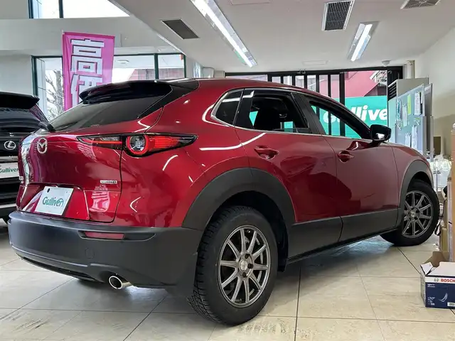 マツダ ＣＸ－３０ 東京都 2022(令4)年 1.1万km ソウルレッドクリスタルM ワンオーナー/純正ナビ(AM/FM/BT/フルセグTV)/バックカメラ/全方位カメラ/F/Rコーナーセンサー/ACC/BSM/LKA/HUD/純正前後ドラレコ/パワーバックドア/D席パワーシート/D/N席シートヒーター/メモリーシート/ステアリングヒーター/スマートキー/プッシュスタート/スペアキー×１/ETC/LEDライト/オートライト/オートハイビーム/ステアリングスイッチ/パドルシフト/革巻きステアリング/プライバシーガラス/アイドリングストップ/純正フロアマット/電格ウィンカーミラー/ISOFIX/エアバック（W＋サイド）/保証書/取扱説明書/記録簿