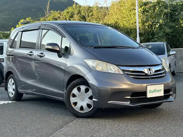 ホンダ フリード G ジャストセレクション 長崎県 2013(平25)年 13.1万km モダンスティールM ワンオーナー/純正HDDナビ（AM/FM/BT/ワンセグTV/CD/DVD）/取扱説明書/スマートキー/スペアキー(1本)/純正フロアマット/片側パワスラ/ABS/VSA/オートライト/SRSエアバッグ/バックカメラ/ECONスイッチ