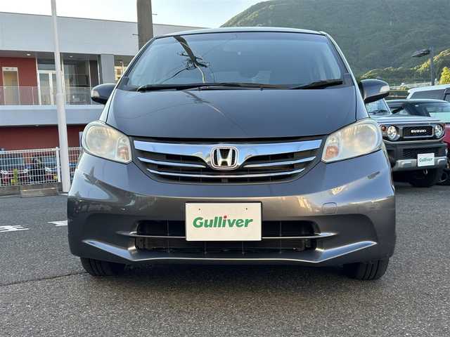 ホンダ フリード G ジャストセレクション 長崎県 2013(平25)年 13.1万km モダンスティールM ワンオーナー/純正HDDナビ（AM/FM/BT/ワンセグTV/CD/DVD）/取扱説明書/スマートキー/スペアキー(1本)/純正フロアマット/片側パワスラ/ABS/VSA/オートライト/SRSエアバッグ/バックカメラ/ECONスイッチ