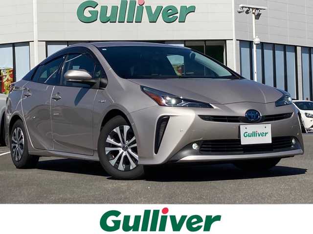 トヨタ プリウス A 佐賀県 2019(平31)年 4.8万km スティールブロンドM 純正9インチナビ/バックカメラ/プリクラッシュセーフティ/レーンディパーチャーアラート/オートハイビーム/アダプティブクルーズコントロール/パーキングアシスト/クリアランスソナー/ブラインドスポットモニター/リアクロストラフィックアラート/ヘッドアップディスプレイ/パワーシート/プッシュスタート/スマートキー/LEDヘッドライト/フォグライト/純正アルミホイール