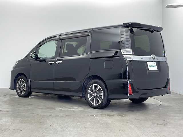 トヨタ ヴォクシー ZS 煌Ⅱ 新潟県 2020(令2)年 5.7万km ブラック 純正９インチメモリナビ(NSZT-Y68T)/フリップダウンモニター/フルセグTV/ビルトインETC/両側パワースライドドア/スマートキー/クルーズコントロール/スマートキー/LEDヘッドライト/両側パワースライドドア/レーンキープアシスト/アイドリングストップ/取扱説明書