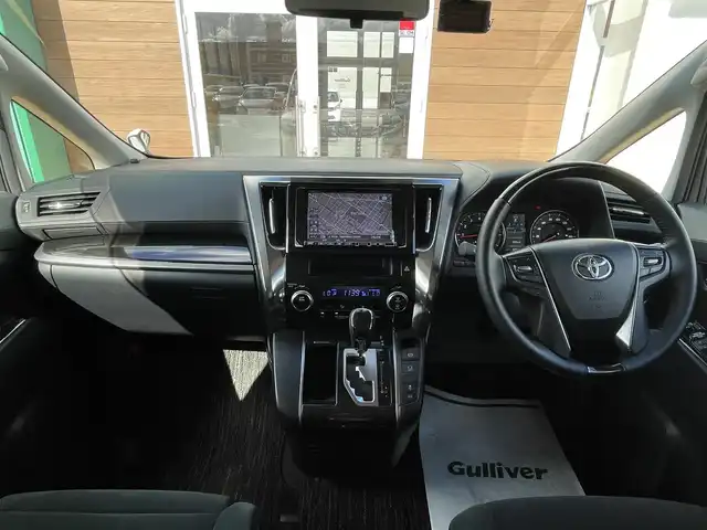 トヨタ アルファード S Aパッケージ 宮崎県 2015(平27)年 6.6万km ホワイトパールクリスタルシャイン 社外ナビ/Bluetooth（電話接続のみ）/ツインサンルーフ/両側パワースライドドア/バックカメラ/ETC/クルーズコントロール/ドライブレコーダー/LEDヘッドライト/純正18インチアルミ/純正フロアマット