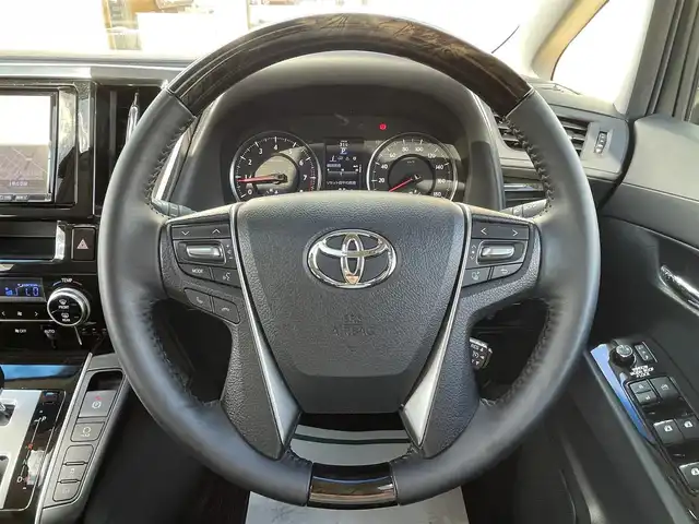 トヨタ アルファード S Aパッケージ 宮崎県 2015(平27)年 6.6万km ホワイトパールクリスタルシャイン 社外ナビ/Bluetooth（電話接続のみ）/ツインサンルーフ/両側パワースライドドア/バックカメラ/ETC/クルーズコントロール/ドライブレコーダー/LEDヘッドライト/純正18インチアルミ/純正フロアマット