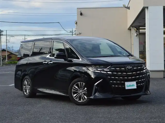 トヨタ アルファードハイブリット Z 栃木県 2024(令6)年 3.4万km ブラック ワンオーナー/Toyota　Safety Sense/[プリクラッシュセーフティ/レーントレーシングアシスト/レーンディパーチャーアラート/アダプティブハイビームシステム/オートマチックハイビーム/ロードサインアシスト/ドライバー異常時対応システム/発進遅れ告知機能/プロアクティブドライビングアシスト/緊急時操舵支援/フロントクロストラフィックアラート/レーンチェンジアシスト]/レーダークルーズコントロール/ヘッドアップディスプレイ/ブラインドスポットモニター/コーナーセンサー/純正14インチディスプレイオーディオ(ナビ付)/[フルセグ/AM/FM/BT/USB/Miracast/MDMI]/オートライト/三眼LEDヘッドライト/フォグランプ/パノラミックビューモニター/パワーシート[前席/2nd]/シートヒーター[前席/2nd]/シートベンチレーション[前席/2nd]/オットマン[2nd]/シートエアコン/パワーバックドア/ユニバーサルステップ/ビルトインETC2.0/ドライブレコーダー[前後]/置くだけ充電/デジタルインナーミラー/100v電源/スマートスペアキー×1/取扱説明書/保証書