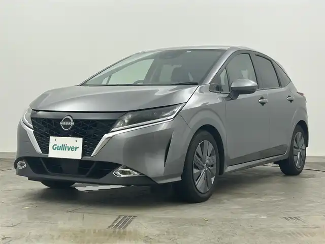 日産 ノート X 岡山県 2022(令4)年 1万km ダークメタルグレー 純正9型ディスプレイオーディオ/(USB/BT/フルセグTV/CarPlay/HDMI)/全周囲カメラ/デジタルインナーミラー/ETC/ステアリングスイッチ/衝突軽減ブレーキ/レーンキープアシスト/オートハイビームアシスト/LEDオートヘッドライト/ブラインドスポットモニター/スマートキー