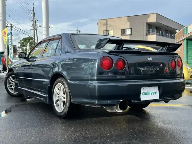 日産 スカイライン 25GT－X 長野県 2000(平12)年 7.5万km 紺Ⅱ 社外ナビ/・Bluetooth/CD/DVD/TV/サンルーフ/社外ETC/ドライブレコーダー/エアロ付き/純正16インチAW/社外ステアリング/電格ミラー/リモコンキー