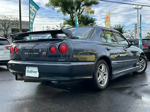 日産 スカイライン 25GT－X 長野県 2000(平12)年 7.5万km 紺Ⅱ 社外ナビ/・Bluetooth/CD/DVD/TV/サンルーフ/社外ETC/ドライブレコーダー/エアロ付き/純正16インチAW/社外ステアリング/電格ミラー/リモコンキー