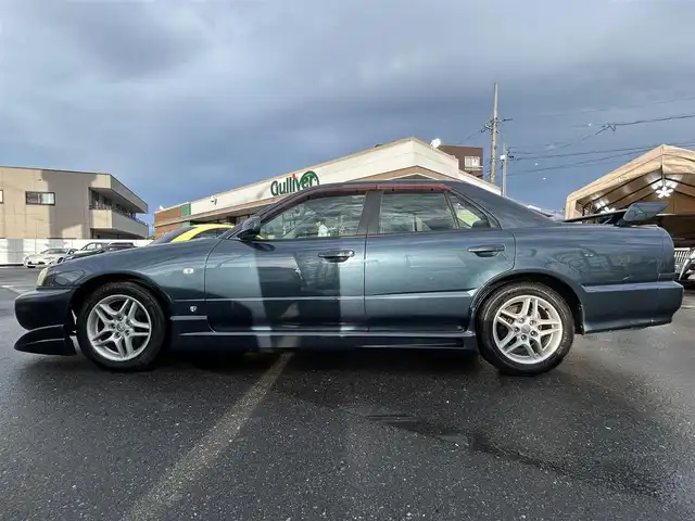 日産 スカイライン 25GT－X 長野県 2000(平12)年 7.5万km 紺Ⅱ 社外ナビ/・Bluetooth/CD/DVD/TV/サンルーフ/社外ETC/ドライブレコーダー/エアロ付き/純正16インチAW/社外ステアリング/電格ミラー/リモコンキー