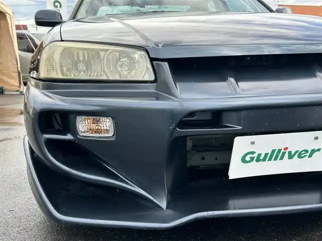 日産 スカイライン 25GT－X 長野県 2000(平12)年 7.5万km 紺Ⅱ 社外ナビ/・Bluetooth/CD/DVD/TV/サンルーフ/社外ETC/ドライブレコーダー/エアロ付き/純正16インチAW/社外ステアリング/電格ミラー/リモコンキー