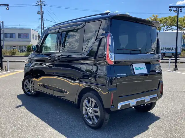 三菱 デリカミニ T プレミアム 鳥取県 2024(令6)年 0.9万km アメジストブラック ４WD・ターボ車/社外ナビ/フルセグ/DVD/CD/BT/ETC/アラウンドビューモニター/デジタルルームミラー/衝突軽減ブレーキ/マイパイロット/両側パワースライドドア/前席シートヒーター/ハーフレザーシート/LEDヘットライト/フォグライト/純正15インチアルミホイール/ルーフスポイラー/電動パーキングブレーキ/プッシュエンジンスタート/アイドリングストップ/フロアマット・バイザー