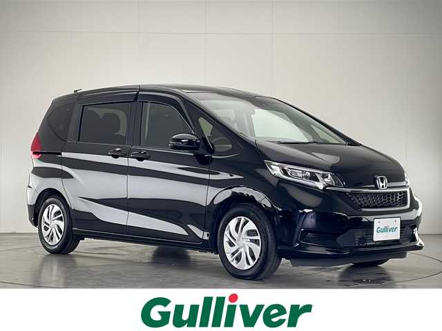ホンダ フリード G ホンダセンシング 宮崎県 2021(令3)年 1.3万km クリスタルブラックパール 禁煙車/ホンダセンシング/純正ディスプレイオーディオTV/（Gathers/WX-211C/CD/FMAM/ワンセグTV)/純正バックカメラ/純正ビルトインETC/純正LEDオートライト/純正フロアマット/両側電動スライドドア/アダプティブクルーズコントロール/レーンディパーチャーアラート/オートエアコン/ハーフシェイドガラス/スマートキー/プッシュエンジンスタート/スペアキー/新車時保証書/取扱い説明書
