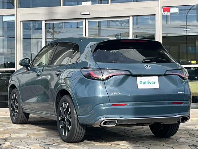 ホンダ ＺＲ－Ｖ ハイブリッド e:HEV Z 静岡県 2025(令7)年 0.3万km 青Ｍ ホンダセンシング/・衝突軽減ブレーキ/・アクティブクルーズコントロール/・レーンキープアシスト/・コーナーセンサー/・ロードサインアシスト/純正ナビ/・フルセグTV/・Bluetooth/USB/ラジオ/主要装備/・全方位カメラ/・パワーバックドア/・ステアリングヒーター/・シートヒーター/・BOSEプレミアムサウンド/・ブレーキホールド/・ETC2.0/・パドルシフト/・オートライト/・オートハイビーム/・ヒルディセントコントロール/・ワイヤレス充電