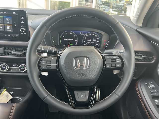 ホンダ ＺＲ－Ｖ ハイブリッド e:HEV Z 静岡県 2025(令7)年 0.3万km 青Ｍ ホンダセンシング/・衝突軽減ブレーキ/・アクティブクルーズコントロール/・レーンキープアシスト/・コーナーセンサー/・ロードサインアシスト/純正ナビ/・フルセグTV/・Bluetooth/USB/ラジオ/主要装備/・全方位カメラ/・パワーバックドア/・ステアリングヒーター/・シートヒーター/・BOSEプレミアムサウンド/・ブレーキホールド/・ETC2.0/・パドルシフト/・オートライト/・オートハイビーム/・ヒルディセントコントロール/・ワイヤレス充電