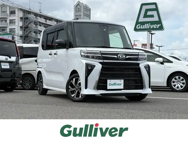 ダイハツ タント カスタム X 大分県 2022(令4)年 1.2万km ブラックマイカメタリック/シャイニングホワイトパール ・社外ナビ(BT/USB)/・バックモニター/・両側パワースライドドア/・スマートアシスト/・コーナーセンサー/・オートハイビーム/・ステアリングリモコン/・シートヒーター/・ブレーキホールド/・ドライブレコーダー/・ETC/・スマートキー/・純正アルミホイール