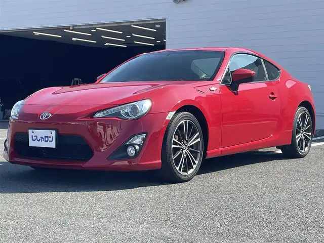 トヨタ ８６ GT 熊本県 2012(平24)年 10.3万km ライトニングレッド (株)IDOMが運営する【じしゃロン熊本店】の自社ローン専用車両になります。/こちらは現金またはオートローンご利用時の価格です。自社ローンご希望の方は別途その旨お申付け下さい/純正ナビ（ＣＤ　ＤＶＤ　ＳＤ　ワンセグＴＶ　ＢＴ）　/バックカメラ　/ＥＴＣ　/パドルシフト　/ＨＩＤヘッドライト　/Ｗ＋サイドエアバッグ　/カーテンエアバッグ　/プッシュスタート　/スマートキー　/電動格納ミラー
