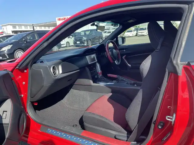 トヨタ ８６ GT 熊本県 2012(平24)年 10.3万km ライトニングレッド (株)IDOMが運営する【じしゃロン熊本店】の自社ローン専用車両になります。/こちらは現金またはオートローンご利用時の価格です。自社ローンご希望の方は別途その旨お申付け下さい/純正ナビ（ＣＤ　ＤＶＤ　ＳＤ　ワンセグＴＶ　ＢＴ）　/バックカメラ　/ＥＴＣ　/パドルシフト　/ＨＩＤヘッドライト　/Ｗ＋サイドエアバッグ　/カーテンエアバッグ　/プッシュスタート　/スマートキー　/電動格納ミラー