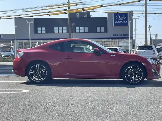 トヨタ ８６ GT 熊本県 2012(平24)年 10.3万km ライトニングレッド (株)IDOMが運営する【じしゃロン熊本店】の自社ローン専用車両になります。/こちらは現金またはオートローンご利用時の価格です。自社ローンご希望の方は別途その旨お申付け下さい/純正ナビ（ＣＤ　ＤＶＤ　ＳＤ　ワンセグＴＶ　ＢＴ）　/バックカメラ　/ＥＴＣ　/パドルシフト　/ＨＩＤヘッドライト　/Ｗ＋サイドエアバッグ　/カーテンエアバッグ　/プッシュスタート　/スマートキー　/電動格納ミラー