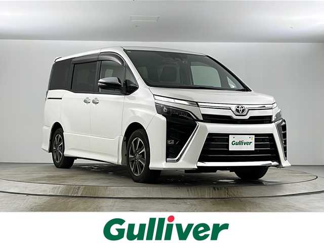 トヨタ ヴォクシー ZS 煌Ⅲ 愛知県 2021(令3)年 3.2万km ホワイトパールクリスタルシャイン 特別仕様車/純正１０インチＳＤナビ(NSZN-Z68T)/（フルセグTV/CD/ＤＶＤ/Ｂｌｕｅｔｏｏｔｈ）　/フリップダウンモニター　/両側パワースライドドア　/トヨタセーフティセンス/・レーンキープアシスト　/・クルーズコントロール　/・オートマチックハイビーム/・誤発進抑制機能/ＥＴＣ　/ドライブレコーダー/LEDヘッドライト/フォグランプ/オートライト/横滑り防止装置/純正１６インチアルミホイール/バックカメラ