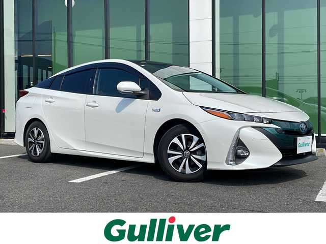 トヨタ プリウス ＰＨＶ S セーフティプラス 福岡県 2018(平30)年 7.7万km ホワイトパールクリスタルシャイン アルパイン製11型フローティングナビ/バックカメラ/ソーラーパネル/ビルトインETC/レーダークルーズコントロール/ステアリングヒーター/クリアランスソナー/スマートキー/プッシュスタート/Wエアバック/ABS