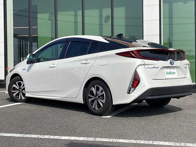 トヨタ プリウス ＰＨＶ S セーフティプラス 福岡県 2018(平30)年 7.7万km ホワイトパールクリスタルシャイン アルパイン製11型フローティングナビ/バックカメラ/ソーラーパネル/ビルトインETC/レーダークルーズコントロール/ステアリングヒーター/クリアランスソナー/スマートキー/プッシュスタート/Wエアバック/ABS