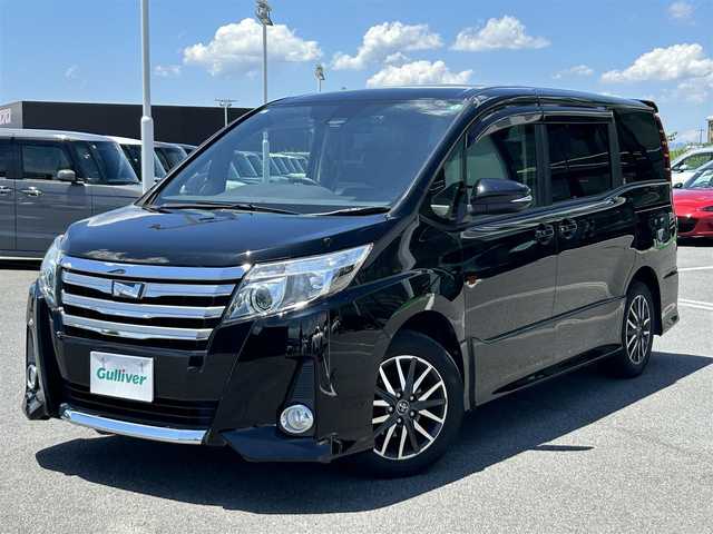 トヨタ ノア Si 奈良県 2016(平28)年 6.7万km ブラック 純正ナビ　[NSZN-W64T]/(BT/FM/AM)/両側パワースライドドア　/フルセグＴＶ /バックカメラ /ビルトインETC /前方ドライブレコーダー /純正16型AW /スペアキー /衝突被害軽減システム /車線逸脱警報 /革巻きステアリング /フォグライト