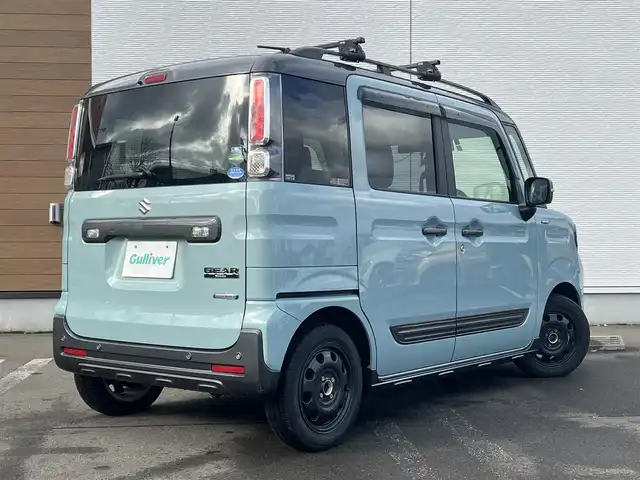 スズキ スペーシア ギア HYBRID XZ 秋田県 2019(平31)年 4.1万km オフブルーメタリック/ガンメタリック2トーンルーフ ４WD/衝突軽減システム/LEDヘッドライト/両側パワースライドドア/社外カーオーディオ（CD/BT/AM/FM）/スマートキー/アイドリングストップ/プッシュスタート/レーンキープアシスト/オートマチックハイビーム/コーナーセンサー/ステアリングスイッチ/前席シートヒーター/ビルトインETC/ドライブレコーダー/ルーフレール/ルーフキャリア/純正フロアマット/社外ドアバイザー/オートライト/オートエアコン/パワーステアリング/パワーウィンドウ/横滑り防止/盗難防止装置/寒冷地仕様/電動格納ウィンカーミラー