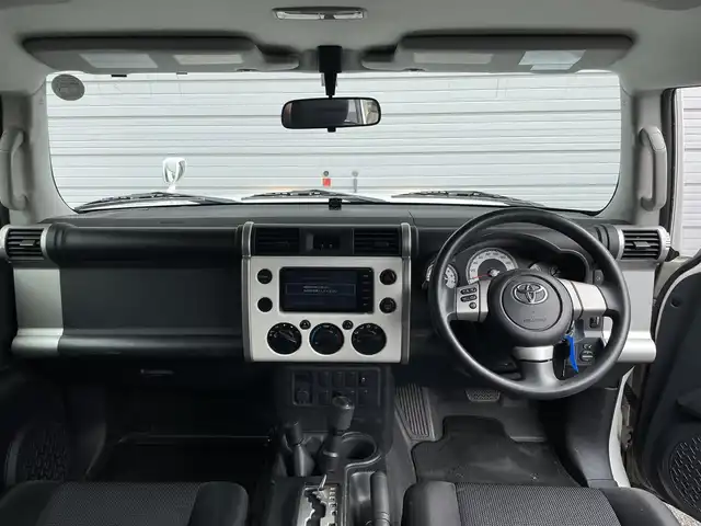 トヨタ ＦＪクルーザー 福島県 2016(平28)年 7.3万km ホワイト 切替4WD/ルーフキャリア/パーキングソナー/純正フロアマット/純正SDナビ/（CD／DVD／Bluetooth/バックカメラ/盗難防止/横滑り防止