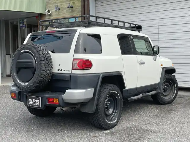 トヨタ ＦＪクルーザー 福島県 2016(平28)年 7.3万km ホワイト 切替4WD/ルーフキャリア/パーキングソナー/純正フロアマット/純正SDナビ/（CD／DVD／Bluetooth/バックカメラ/盗難防止/横滑り防止