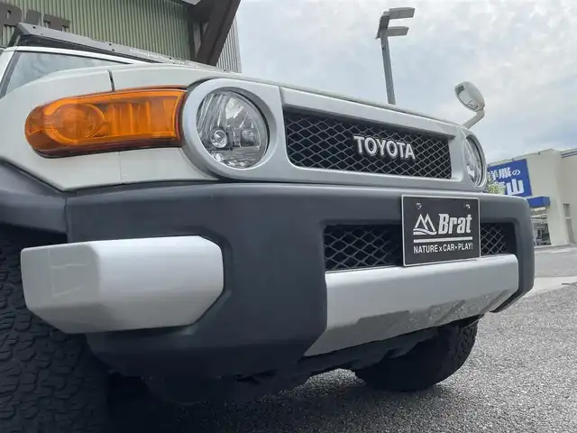 トヨタ ＦＪクルーザー 福島県 2016(平28)年 7.3万km ホワイト 切替4WD/ルーフキャリア/パーキングソナー/純正フロアマット/純正SDナビ/（CD／DVD／Bluetooth/バックカメラ/盗難防止/横滑り防止
