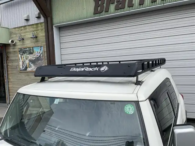 トヨタ ＦＪクルーザー 福島県 2016(平28)年 7.3万km ホワイト 切替4WD/ルーフキャリア/パーキングソナー/純正フロアマット/純正SDナビ/（CD／DVD／Bluetooth/バックカメラ/盗難防止/横滑り防止