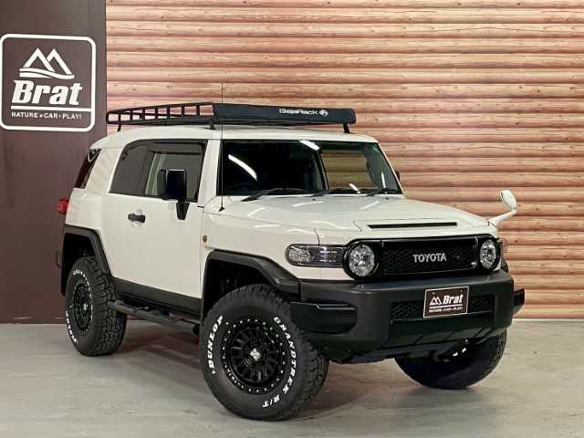 トヨタ ＦＪクルーザー 岩手県 2016(平28)年 7.3万km ホワイト ＡＩＳ検査済み/【2509008719】/4WD(切替）/ルーフキャリア/バックソナー/純正フロアマット/パワーウィンドウ/ETC(通常）/純正ナビ/パワステ/盗難防止装置/横滑り防止装置/ABS/エクストリームJ　XJ08（社外）/ダンロップグラントレックR/T 01（社外）/Bratオリジナルリフトアップキット（社外）/スモークウィンカー（社外）/バックランプ（社外）/トラクションコントロールスイッチ（純正）/社外パーツ取付有