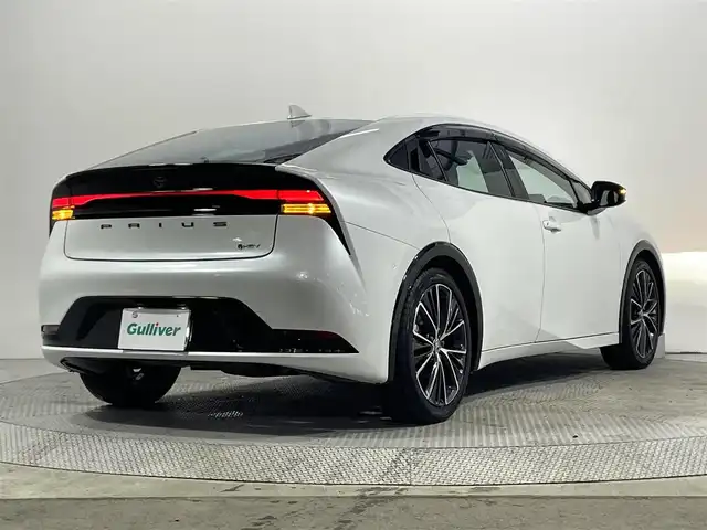 トヨタ プリウス Z 大阪府 2023(令5)年 1.1万km プラチナホワイトパールマイカ 純正ナビ/衝突被害軽減/ＢＳＭ/３６０度カメラ/ＡＣＣ/ドラレコ前後/電動リアゲート/ＥＴＣ/レーンアシスト　/コーナーセンサー/シートヒーター/シートエアコン/オートハイビーム/ＬＥＤオートライト